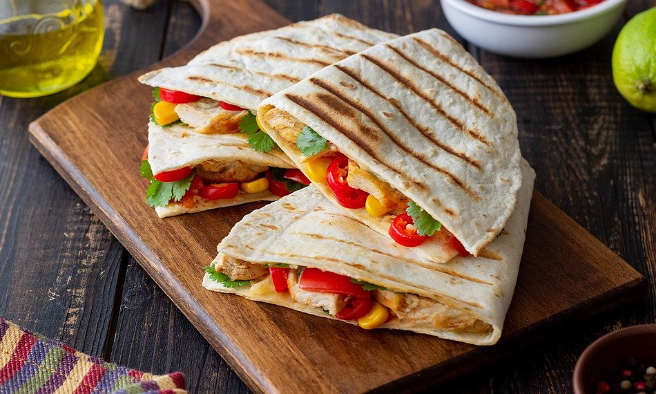 Fresh Mexican quesadilla with melted cheese